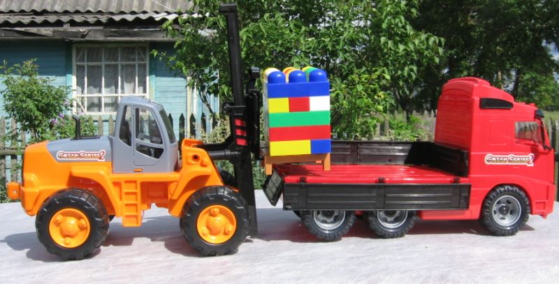 Детский грузовик Volvo с открывающимися бортами