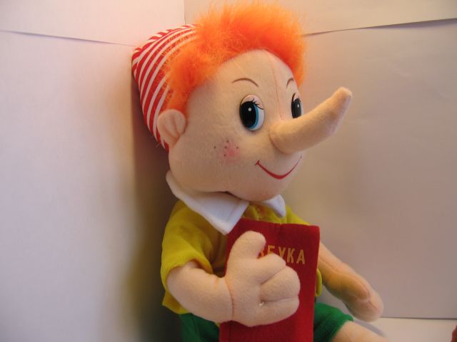 Мягкая игрушка говорящий Буратино с азбукой Л198