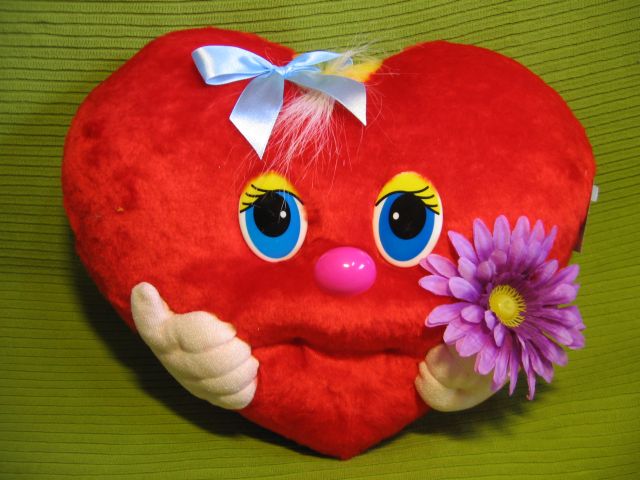 Мягкая игрушка подушка в виде сердца с глазками - 33 см
