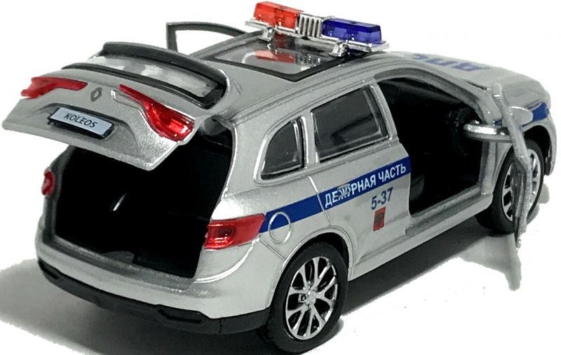 Машинка Renault Koleos с двумя открывающимися дверями и багажником. Багажник машинки очень просторный. igrushechnaya-mashinka-renault-koleos-policiya-05.jpg